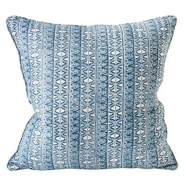 Blue patterned pillow on a white background