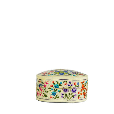 Decorative heart-shaped object with floral patterns