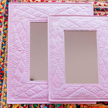 pressed metal mirror
