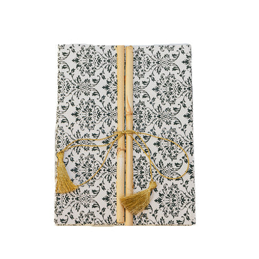 recycled-cotton paper journal with gold tassel ties