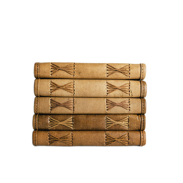 leather-bound notepads with quotes and hand-stitched spines