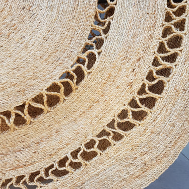 handwoven round jute rug
